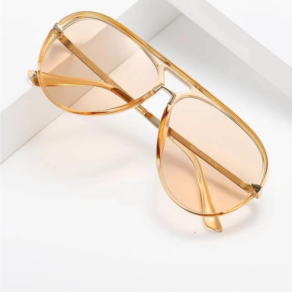 Tan clear frame glasses